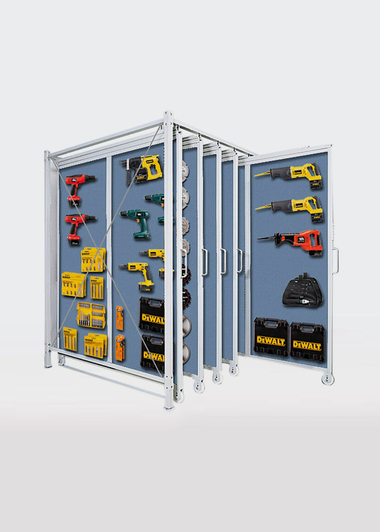 Système autoportant à panneaux coulissants pour outils et équipements