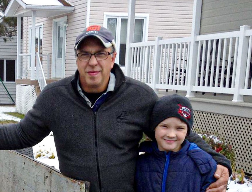 Montel employee with a child.