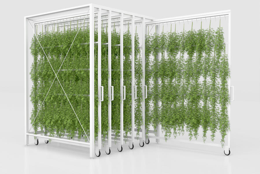 White mobile structure with hanging shelves, allowing plants to grow vertically.